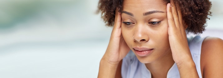 Woman-Holding-Head Stressed Woman Holding Head